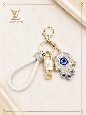 Louis Vuitton Gold Lock 🔑 Authentic LV Padlock + Unbranded Evil Eye Bag Charm